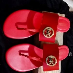 Size 8 dark orange Michael  kros Sandals